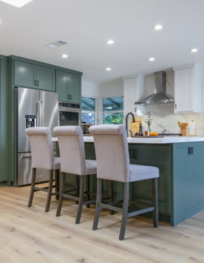 Sage green kitchen island with counter stools, San Jose, CA