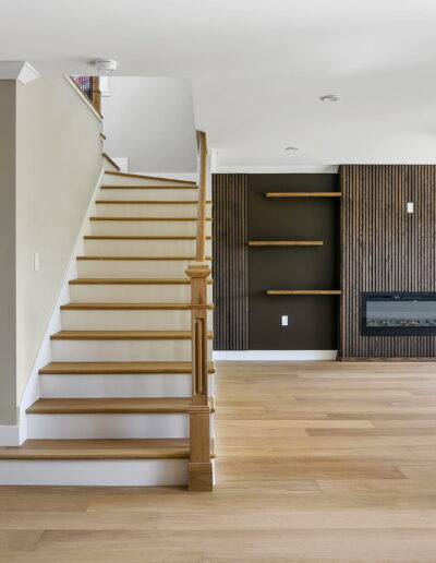 Living room with new staircase to the second-story addition, Fremont, CA